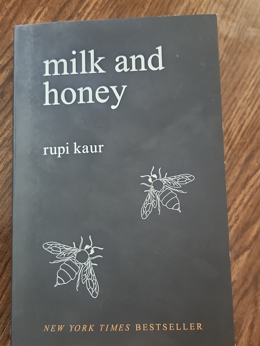 milk and honey by rupi kaur — black cover poetry book